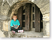 Battle of The Alamo: A window of the Long Barrack Museum at the Alamo